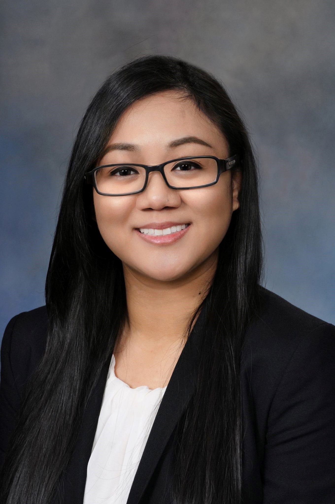 Picture of Maryann Muyco smiling.